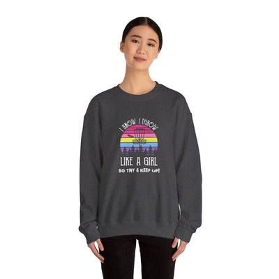 I Know I Throw Like A Girl Unisex Heavy Blend™ Crewneck Sweatshirt
